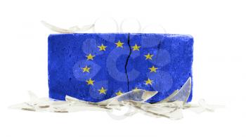 Brick with broken glass, violence concept, flag of the EU