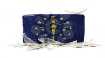 Brick with broken glass, violence concept, flag of Indiana