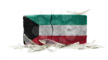 Brick with broken glass, violence concept, flag of Kuwait