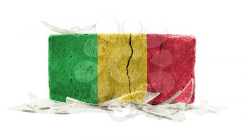 Brick with broken glass, violence concept, flag of Mali