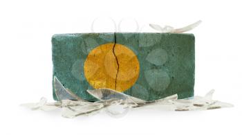 Brick with broken glass, violence concept, flag of Palau