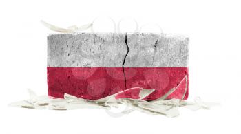 Brick with broken glass, violence concept, flag of Poland