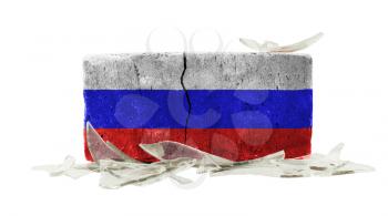 Brick with broken glass, violence concept, flag of Russia
