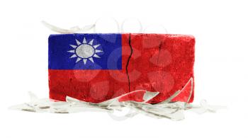 Brick with broken glass, violence concept, flag of Taiwan