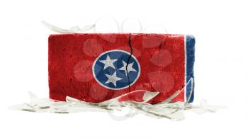 Brick with broken glass, violence concept, flag of Tennessee