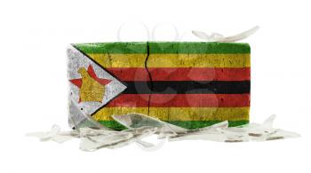 Brick with broken glass, violence concept, flag of Zimbabwe