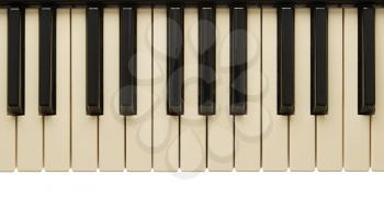 Old slightly yelow piano keyboard isolated on white