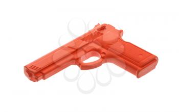 Dirty red training gun isolated on white, law enforcement