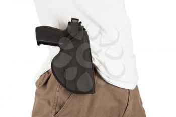Close-up of a man with holster and a gun, isolated on white