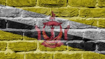 Very old brick wall texture, flag of Brunei