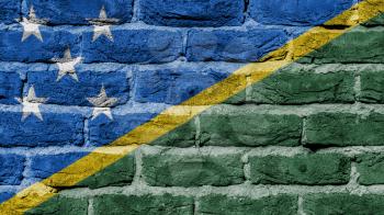 Very old brick wall texture, flag of the Solomon Islands