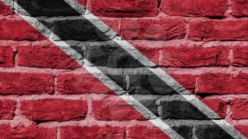 Very old brick wall texture, flag of Trinidad and Tobago