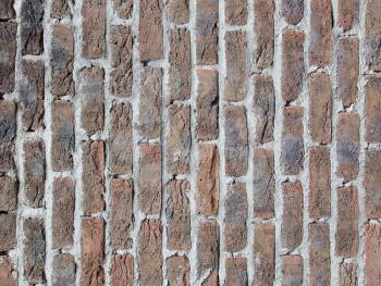 Very old dark red brick wall texture