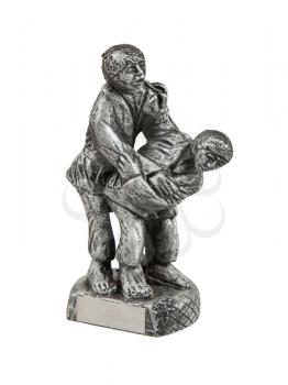 Very old trophy in the shape of two man, judo, isolated on white