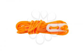 Orange rope used for bracing a tent, isolated