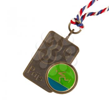 Old medal isolated on a white background