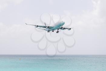 ST MARTIN, ANTILLES - July 19: the tourist office and Air France signs an agreement to strengthen their partnership (joint communication plan). Daily A340 about to touch down in July 19. 2013 at SXM.