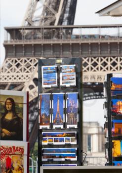 PARIS - JULY 27: Postcard stand at the Eiffel Tower on July 27, 2013, in Paris. The Eiffel Tower is the most visited tourist attraction in France and one of the most recognizable landmarks in the worl