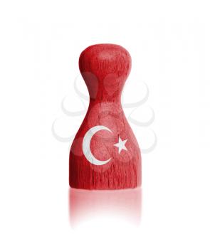 Wooden pawn with a painting of a flag, Turkey