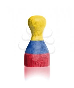 Wooden pawn with a painting of a flag, Colombia