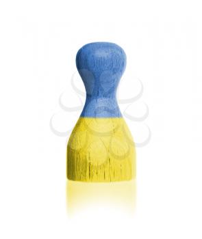 Wooden pawn with a painting of a flag, Ukraine
