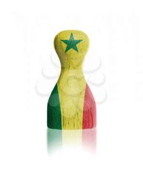 Wooden pawn with a painting of a flag, Senegal