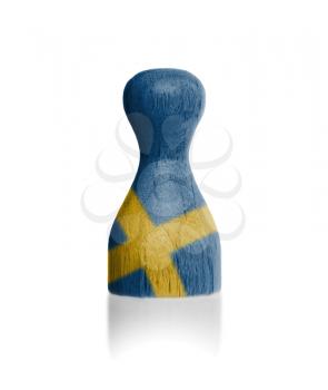 Wooden pawn with a painting of a flag, Sweden