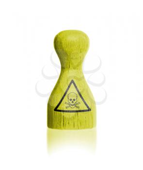 Wooden pawn with a painting, danger - poisonous