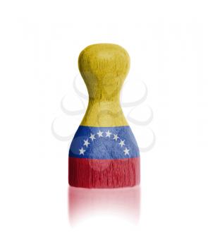 Wooden pawn with a painting of a flag, Venezuela