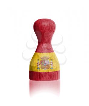 Wooden pawn with a painting of a flag, Spain
