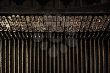 Detail of an old typewriter, warm filter