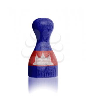 Wooden pawn with a painting of a flag, Cambodia