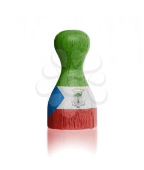 Wooden pawn with a painting of a flag, Equatorial Guinea