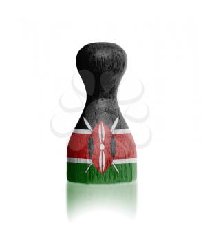 Wooden pawn with a painting of a flag, Kenya