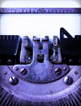 Detail of an old typewriter, cold blue