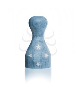 Wooden pawn with a painting of a flag, Micronesia