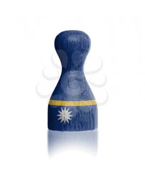 Wooden pawn with a painting of a flag, Nauru