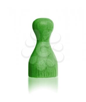 Wooden pawn with a solid color, green