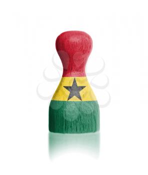 Wooden pawn with a painting of a flag, Ghana