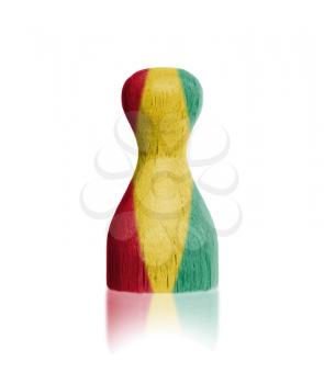 Wooden pawn with a painting of a flag, Guinea