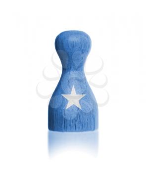 Wooden pawn with a painting of a flag, Somalia