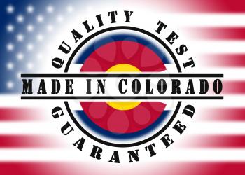 Quality test guaranteed stamp with a state flag inside, Colorado