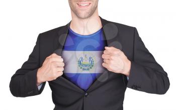 Businessman opening suit to reveal shirt with flag, El Salvador