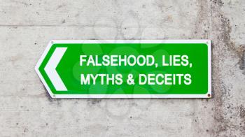 Green sign on a concrete wall - Falsehood lies myths deceits