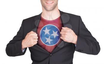 Businessman opening suit to reveal shirt with state flag (USA), Tennessee