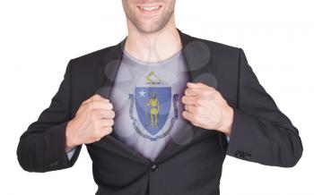 Businessman opening suit to reveal shirt with state flag (USA), Massachusetts
