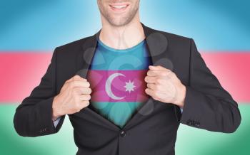 Businessman opening suit to reveal shirt with flag, Azerbaijan