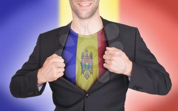 Businessman opening suit to reveal shirt with flag, Moldova