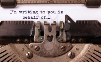 Vintage inscription made by old typewriter, I'm writing to you in behalf of