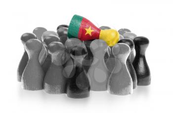 One unique pawn on top of common pawns, flag of Cameroon